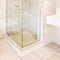 Modern shower with tiled walls and floor