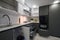 Modern simple trendy dark grey and white kitchen