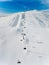 Modern ski chair-lift in Finland Lapland ski resort. Aerial view from above.