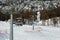 Modern Ski Lifts with Skiers in Italian Dolomites Alps in Winter Day with Snow