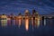 Modern skyline of Louisville KY reflected on the river water, illuminated at night