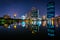 Modern skyscrapers and Lake Rajada at night, at Benjakiti Park,