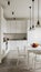 Modern, sleek kitchen with white surfaces, pendant lights, fruit bowl, and polished concrete floors.