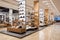Modern, sleek shoe store interior featuring ambient lighting, minimalist shelves, and an elegant, contemporary design