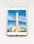 Modern smartphone displaying full screen picture of Leuca, Italy