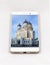 Modern smartphone displaying full screen picture of Tallinn, Est