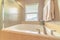 Modern spa bath with warm window lighting