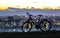 Modern sports city bicycle standing alone over night city background