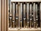 Modern steel organ pipes, structure of organ, musical instrument. close up view inside of musical instrument