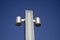 Modern steel street lamp on sky background