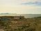 Modern stony family house on the spring seaside, Norway island. A traditional stone house