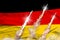 Modern strategic rocket forces concept on flag fabric background, Germany ballistic missile attack - military industrial 3D