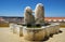 A modern street art marble sculpture of couple sitting near fountain at the lookout point of Garden of Diana. Evora. Portugal