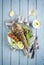 Modern style Atlantic barbecue sea robin fish with lettuce and tomatoes on a design plate