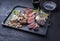 Modern style barbecue dry aged wagyu Brazilian picanha steaks sliced and served with cream sauce and mushrooms