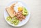 Modern style clean food, bread, egg, tuna salad, kiwi and avocado