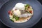 Modern style gourmet fried skrei cod fish Thai curry with jasmine rice and chili on a design plate