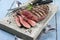 Modern style traditional barbecue dry aged angus sirloin beef steak on a design stone tray
