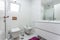 Modern stylish bathroom in the house, hotel, in white colors. Conceptual photo.