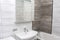 Modern and stylish interior of the bathroom in the apartment, close-up of the washbasin.