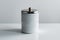 Modern, stylish, and secure white cylinder with reflective surface and silver lid