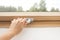 A Modern Sunroof. Handle for opening the attic window, close-up. Mansard Design Of An Attic House. Roofing Construction