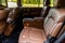 Modern SUV car inside. Leather back passenger seats in modern luxury car.