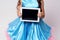 Modern technologies. Computer tablet. Blue dress