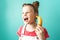 Modern technology: A teenager girl uses a yellow banana as a phone.
