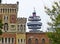 Modern telecommunication tower and brick-building Arsenal