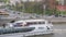 A modern tourist boat sails along the Moscow river. Moscow