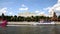 Modern tourist boats float along the Moscow river against the background of the Kremlin, Moscow