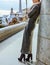 Modern tourist woman standing at Guell Park, Spain in winter