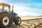 Modern tractor working in a field.