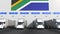 Modern trailer trucks load or unload at warehouse bays with flag of South Africa. logistics related conceptual 3D