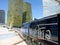 Modern Tram leaves Aria Express - Bellagio / Vdara Station pulls into station