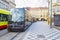 Modern trams on main square of Prague`s Mala Strana next to St. Nicholas Church, Prague