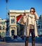 Modern traveller woman in Milan, Italy looking into distance