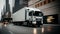 Modern truck on the entry road to the city. Blured motion city background