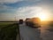 Modern trucks parked on country road