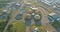 In a modern wastewater treatment plant, a panoramic view is of aeration tanks that are used to purify water