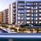 A modern waterfront residential complex with sleek, glass facades and private marina access16