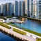 A modern waterfront residential complex with sleek, glass facades and private marina access6