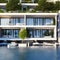 A modern waterfront residential complex with sleek, glass facades and private marina access9