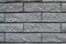 Modern weathered colored slate brick wall texture