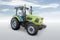 Modern wheeled tractor isolated on bright background