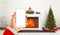 Modern white hone in Santa Claus hand with isolated screen for mockup.