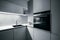 Modern white kitchen with accessories in stainless steel