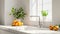 Modern white minimalistic kitchen interior details. Stylish white quartz countertop with kitchen sink with water tap