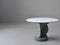 modern white round table with gray round chairs on grey background, Ai Generated